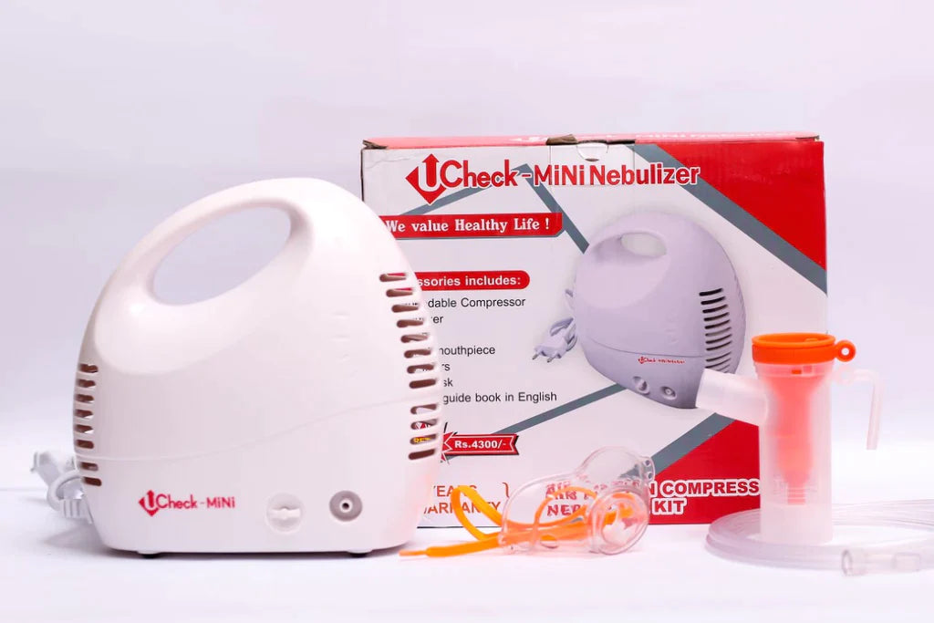 Ucheck mini nebulizer machine with accessories and a packaging box.